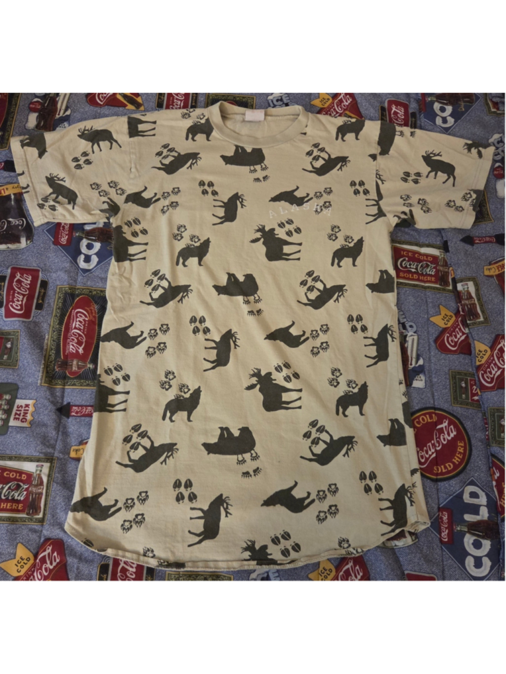 Alaska black All Over Print! Animal silhouettes and paw prints t-shirt
